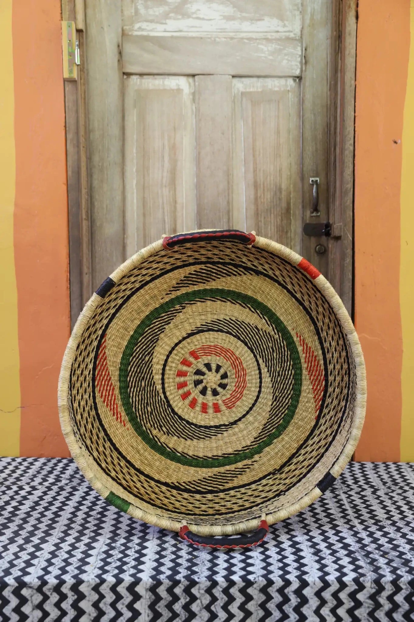 Woven Tray Wall Decor (Large) by The Baba Tree. Premium elephant grass tray with leather handles. Bolgatanga artisan craftsmanship.
