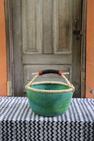 Round shopping basket, a handwoven Bolga basket in elephant grass from northern Ghana.
