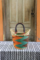 Nyariga shopping basket, a handwoven Bolga basket in elephant grass with a coil-woven rim.