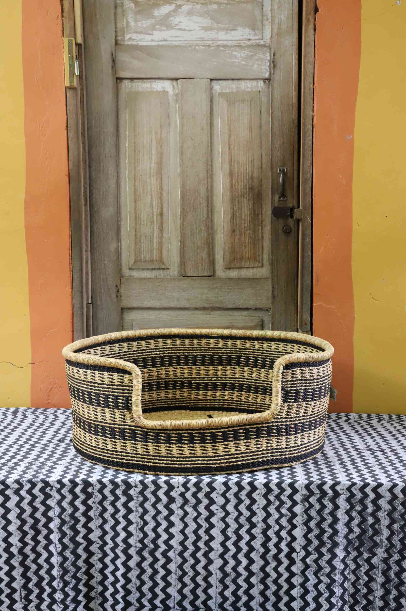 Large handwoven African basket dog bed in elephant grass from Bolgatanga, Ghana.