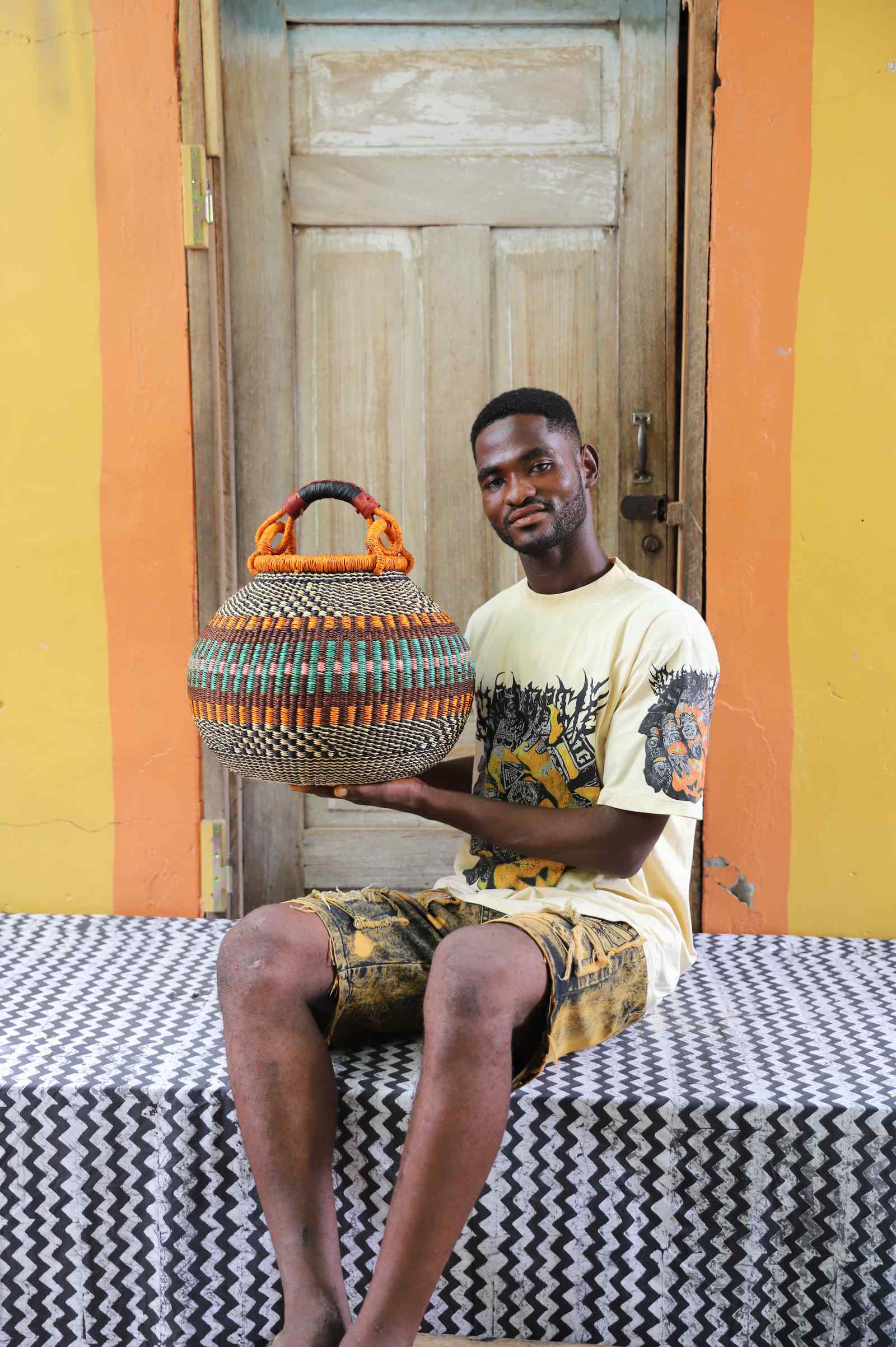 Handwoven African basket in elephant grass, a pot form woven by hand in northern Ghana.