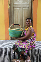 Medium woven basket in elephant grass, 38 cm wide, a catch-all for the home.