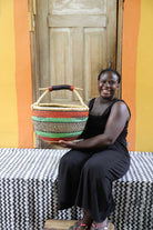 Handwoven African basket in elephant grass, round and open, 38 cm across.