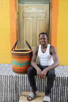 Handwoven African basket for towels and throws, woven in elephant grass.