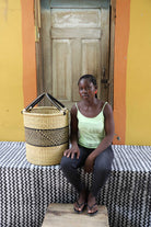 Open-top woven laundry basket in elephant grass from Bolgatanga, Ghana.